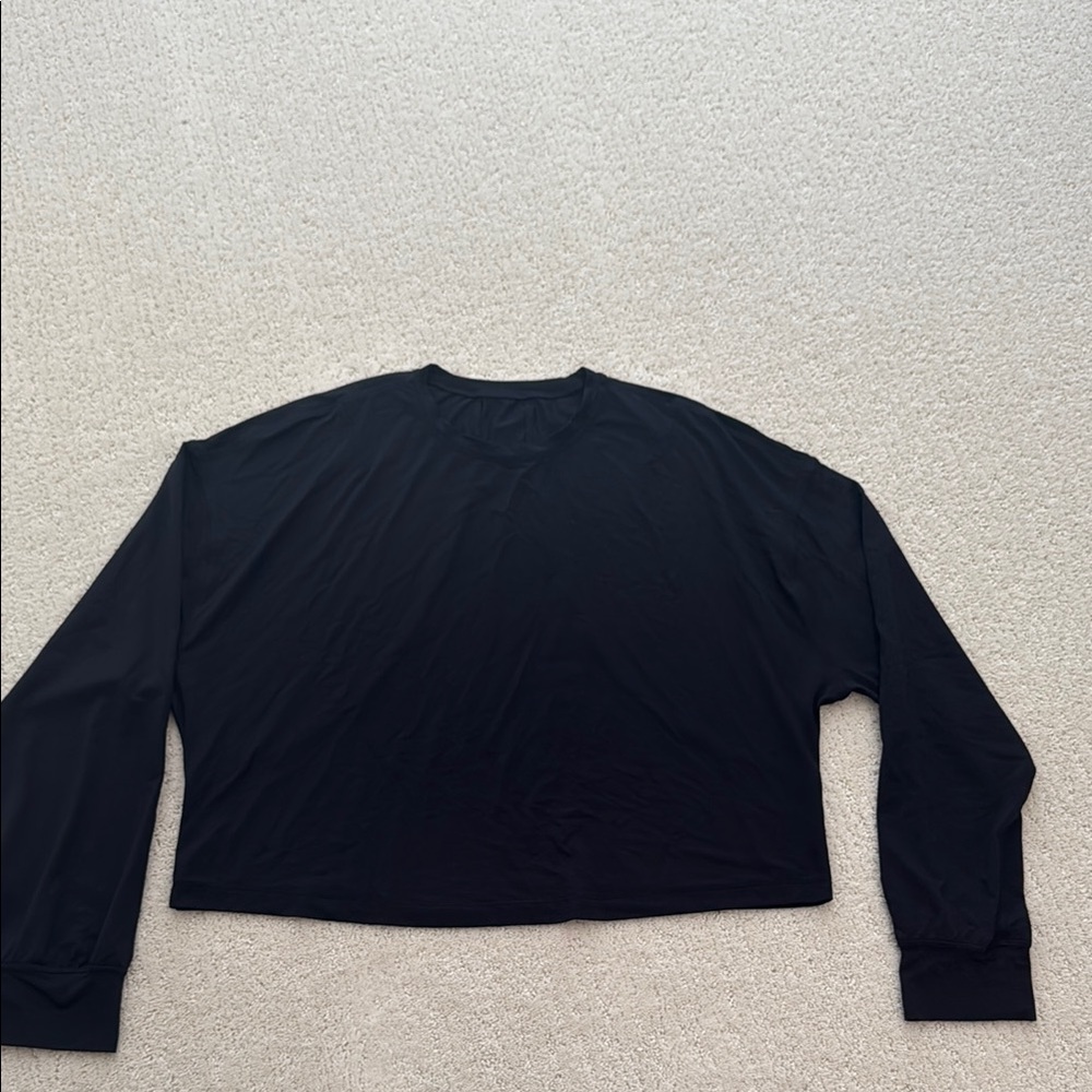 Lululemon long sleeve shirt. A bit cropped. Worn once.